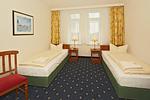 Schlafzimmer mit zwei Einzelbetten - Seehof 204 - Top-Hundeurlaub