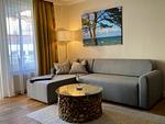 Wohn-Essbereich mit Couch - Seehof 213 - Top-Hundeurlaub