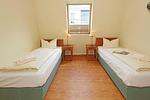 Schlafzimmer mit zwei Einzelbetten - Seehof 231 - Top-Hundeurlaub