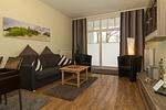 Wohn-Essbereich mit Couch - Meeresblick 008 - Top-Hundeurlaub