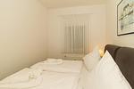 Schlafzimmer mit Doppelbett - Meeresblick 008 - Top-Hundeurlaub