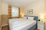 Schlafzimmer mit Doppelbett - Meeresblick 219 - Top-Hundeurlaub