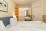 Schlafzimmer mit Doppelbett - Meeresblick 219 - Top-Hundeurlaub