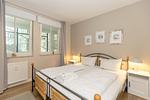 Schlafzimmer mit Doppelbett - Meeresblick 226 - Top-Hundeurlaub