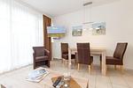 Wohn-Essbereich mit Esstisch und Sitzgelegenheit - Meeresblick 316 - Top-Hundeurlaub