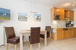 Wohn-Essbereich mit Esstisch und Sitzgelegenheit - Meeresblick 316 - Top-Hundeurlaub
