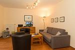 Wohn-Essbereich mit Couch - Meeresblick 321 - Top-Hundeurlaub