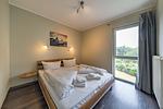 Zweites Schlafzimmer mit Doppelbett im sinf51-1-S, Nordsee-Resort Friesland, Mellumweg 1 in Schillig - NordseeResort Friesland 51-1-S - Top-Hundeurlaub