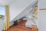 Schlafzimmer mit zwei Einzelbetten im kbmb507, Meerblick 507, Ostseeallee 45 in Kühlungsborn - Meeresblick 507 - Top-Hundeurlaub