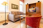 Wohn-Essbereich mit Couch - Villa Aegir 101 - Top-Hundeurlaub