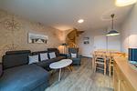 Wohnzimmer mit Couch und Sessel - Hus Inselkieker 218  - Top-Hundeurlaub