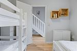 Schlafzimmer mit Einzelbett und Hochbett - Urlauberdorf 42a - Top-Hundeurlaub
