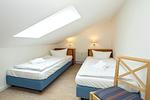 Schlafzimmer mit zwei Einzelbetten - Strand-Park 132 - Top-Hundeurlaub