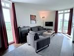 Wohn-Essbereich mit Couch - Resort Deichgraf 31-04 - Top-Hundeurlaub