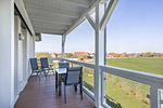 Überdachter Balkon mit Sitzgelegenheit - Resort Deichgraf 31-08 - Top-Hundeurlaub