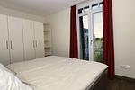 Schlafzimmer mit Doppelbett und Kleiderschrank - Resort Deichgraf 31-12 - Top-Hundeurlaub