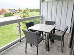 Überdachter Balkon mit Sitzgelegenheit - Resort Deichgraf 31-12 - Top-Hundeurlaub