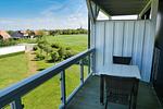 Überdachter Balkon mit Sitzgelegenheit - Resort Deichgraf 31-12 - Top-Hundeurlaub