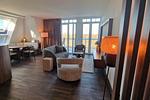 Wohn-Essbereich mit Couch - Resort Deichgraf 31-18 - Top-Hundeurlaub
