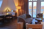 Wohn-Essbereich mit Couch - Resort Deichgraf 31-18 - Top-Hundeurlaub