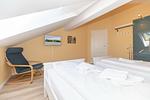 Schlafzimmer mit zwei Einzelbetten - Apartment-Residenz Ostseestrand 32 - Top-Hundeurlaub
