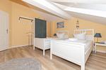 Schlafzimmer mit zwei Einzelbetten - Apartment-Residenz Ostseestrand 32 - Top-Hundeurlaub