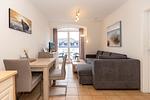 Wohn-Essbereich mit Couch - Apartment-Residenz Ostseestrand 35 - Top-Hundeurlaub