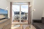 Wohn-Essbereich mit Couch - Apartment-Residenz Ostseestrand 35 - Top-Hundeurlaub