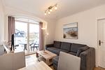 Wohn-Essbereich mit Couch - Apartment-Residenz Ostseestrand 35 - Top-Hundeurlaub