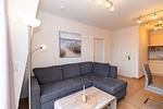 Wohn-Essbereich mit Couch - Apartment-Residenz Ostseestrand 35 - Top-Hundeurlaub
