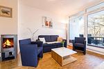 Wohn-Essbereich mit Couch - DünenResort Binz 116 - Top-Hundeurlaub