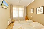 Schlafzimmer mit Doppelbett - Dünenschloss 1-07 - Top-Hundeurlaub
