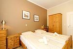 Schlafzimmer mit Doppelbett - Dünenschloss 1-07 - Top-Hundeurlaub
