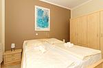 Schlafzimmer mit Doppelbett - Dünenschloss 1-07 - Top-Hundeurlaub