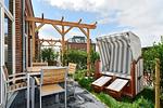 Terrasse mit Sitzmöbel - Aparthotel Anna Düne 0-03 - Top-Hundeurlaub