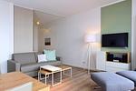 Wohn/ Essbereich mit Fernseher - Aparthotel Anna Düne 1-21 - Top-Hundeurlaub