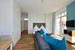 Wohn/ Essbereich mit Fernseher - Aparthotel Anna Düne 2-27 - Top-Hundeurlaub