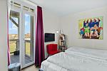 Schlafzimmer mit Zugang zum Balkon - Resort Deichgraf 31-07 - Top-Hundeurlaub