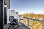 Balkon mit Tisch, Sitzgelegenheiten - Resort Deichgraf 27-21 - Top-Hundeurlaub