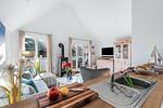 Wohn-Essbereich mit Couch - Ostseepark Rügen 21 - Top-Hundeurlaub