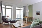 Wohn/ Essbereich mit Sessel - Aparthotel Anna Düne 1-23 - Top-Hundeurlaub