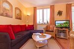 Wohn-Essbereich mit Couch - Dünenschloss 1-33 - Top-Hundeurlaub