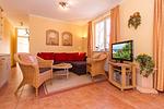 Wohn-Essbereich mit Couch - Dünenschloss 1-33 - Top-Hundeurlaub