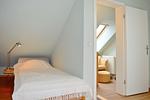 Schlafzimmer mit Einzelbett - Meeresblick 506 - Top-Hundeurlaub
