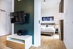 Wohn-Essbereich mit Couch und Flatscreen-TV - Krusespeicher 6-69 - Top-Hundeurlaub