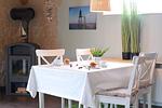 Wohnzimmer - Ferienhaus Mellumplate 32 - Top-Hundeurlaub