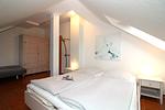 Schlafzimmer - Appartementhaus Villa Sanssouci Fewo 2 "Kaptain's Kiek" - Top-Hundeurlaub