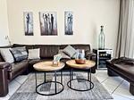 Wohnzimmer - Haus: Terrasse, Seeblick, Sauna- und Schwimmbadnutzung - Top-Hundeurlaub
