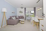 Wohnzimmer - FeWo 01 MEERglück: Terrasse - Top-Hundeurlaub