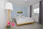 Schlafzimmer - FeWo 01 MEERglück: Terrasse - Top-Hundeurlaub